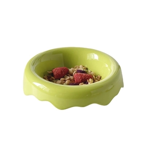 Nordic ceramic pet bowl in green with wavy edges for food and cereal breakfast