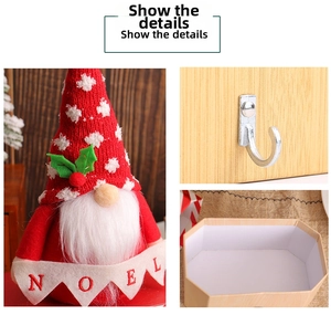 Close-up of Christmas gnome candy box with NOEL banner and silver metal hook detail