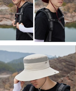 Detail of beige outdoor sun hat showing breathable mesh and adjustable windproof strap