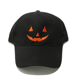 Black cotton baseball cap featuring an orange Halloween pumpkin Jack-o'-lantern embroidery