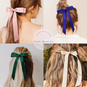 Elegant satin double bow hair clips with long ribbons in four classic colors
