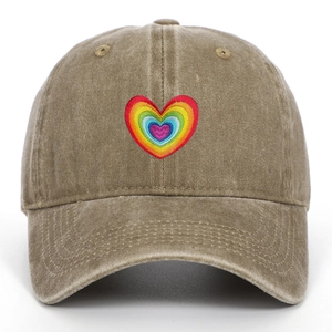 Close-up of rainbow heart embroidery on washed cotton khaki baseball cap details