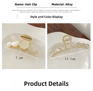Detailed comparison of 7cm and 11.1cm gold alloy hair claws with opal stones