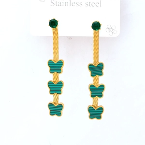 Long stainless steel tassel earrings featuring gold chains and green butterfly charms
