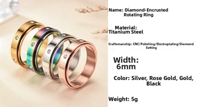 Detail view showing 6mm titanium steel spinner rings in gold, silver and rose gold colors