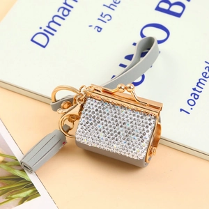 Luxury grey leather coin purse keychain with sparkling rhinestones and tassel detail