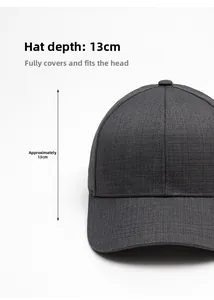 Detail showing 13cm deep crown and twill fabric texture of a dark grey baseball cap