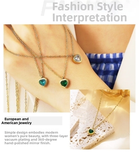 Detail of 18k gold plated heart pendant necklace with colorful cubic zirconia stones