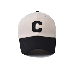 Close-up of premium C letter embroidery on contrast washed cotton baseball cap