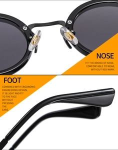 Detail view of comfortable nose pads and ergonomic temple tips on black round punk sunglasses