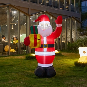 Giant inflatable Santa Claus with gift box climbing outdoor wall for Christmas decor
