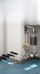 Detail view of wall-mounted rotating kitchen hook rack in gunmetal finish for utensils