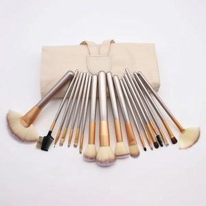 Detail of 18pcs makeup brush set with beige roll pouch and silver handles