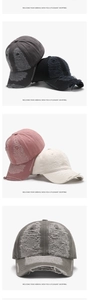 Distressed cotton baseball cap detail with vintage frayed edges and torn fabric textures