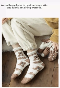 Close-up of cozy coral fleece socks and gloves set featuring cute brown bear patterns