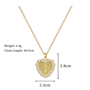 Detailed size specifications for gold heart pendant necklace with saint medal and crystals