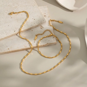 Parure de bijoux minimaliste avec collier et bracelet en acier inoxydable doré 18 carats