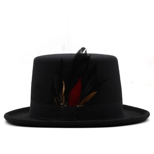 Detail of vintage black top hat featuring a decorative three-color feather accent band