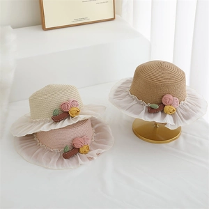 Kids woven straw hats with lace trim and floral accents in beige pink and yellow