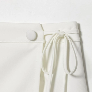 Elegant white wrap skirt with textured fabric, side button and stylish tie-up waist detail