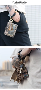 Detail of leopard print PU leather card holder keychain with silicone bead wristlet
