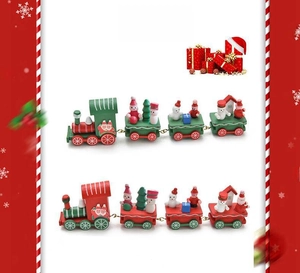 Two sets of festive wooden Christmas trains featuring Santa and snowmen figurines