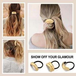 Detailed view of three gold matte metal ponytail clips with elastic bands on pink background