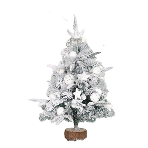 Mini flocked Christmas tree with wood base, white ornaments, and Merry Christmas sign