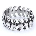 Detailed view of a vintage silver gothic fishbone spine ring in stainless steel