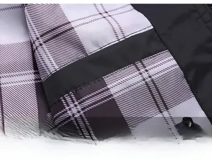 Detailed view of the classic black and white plaid inner lining for men's casual jackets