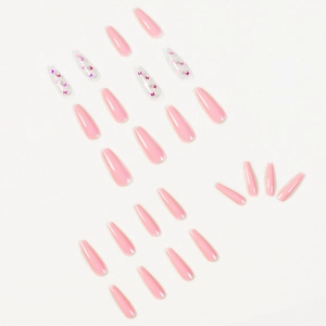 Pink laser butterfly press-on nails set in long coffin shape on white background