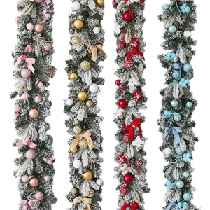 Flocked white Christmas garland with pink gold red and blue ornaments for festive decor
