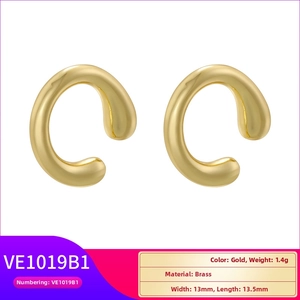 Macro shot of 13mm gold-plated brass C-shape ear cuffs with a polished mirror finish