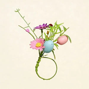 Close-up of Easter napkin ring with colorful eggs, pink daisies, and green foliage