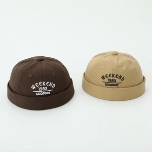 Kids vintage cotton skull caps in brown and khaki with Weekend 1983 embroidery
