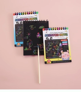 Detailed view of DIY rainbow scratch art note set with 10 sheets and bamboo stylus tool