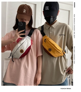 Detail view of stylish color-block crossbody bags shown on models for outdoor fashion