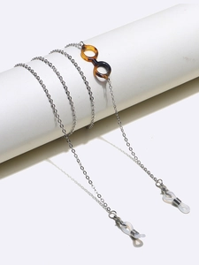 Silver metal eyewear chain with leopard pattern frame charms and non-slip rubber loops