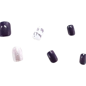Short square purple press-on nails with glitter accents and floral leaf patterns