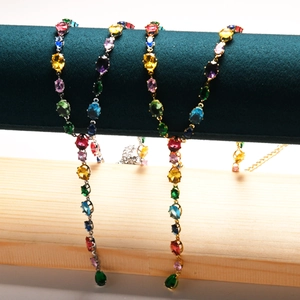 Bohemian gold and silver Y-shaped necklaces with oval multi-color gemstones and crystals
