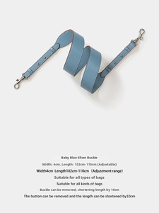 Adjustable light blue leather bag strap with silver metal hooks and 4cm width detail