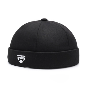 Retro black Miki hat with white embroidery logo, minimalist brimless docker cap for men and women