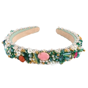 Baroque style green headband with white pearls and sparkling crystal gemstones