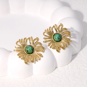 18K gold plated flower stud earrings with green stone on a white display stand