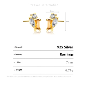 Detail view of gold-plated S925 silver stud earrings with yellow gemstone and zircon