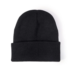 Close-up detail of the black knitted beanie texture with high-quality ribbed fold design