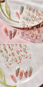 Detail of M-993 strawberry nail stickers with 3D embossing and glitter floral patterns