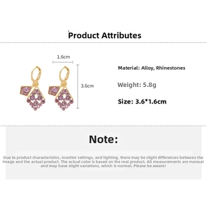 Detail view of golden rhombus earrings with purple rhinestones and product dimensions