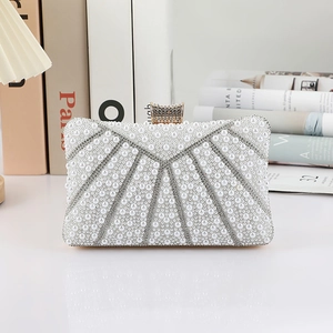 Elegant pearl evening clutch bag with rhinestone geometric lines for party and wedding events.