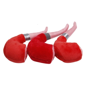 Detailed view of three red pipe-shaped plush dog toys with pink mesh and grey ribbon accents